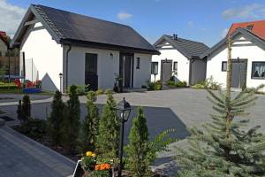 Domki pod katalpami Mikołajki