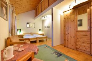 Śpioch - Pokoje Gościnne 