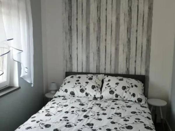 Domki pod katalpami Mikołajki