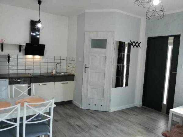 Domki pod katalpami Mikołajki