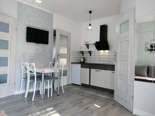 Domki pod katalpami Mikołajki