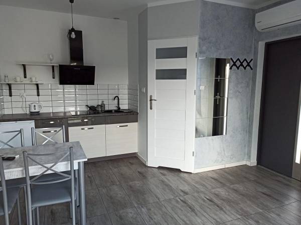 Domki pod katalpami Mikołajki