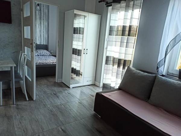 Domki pod katalpami Mikołajki