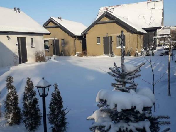 Domki pod katalpami Mikołajki