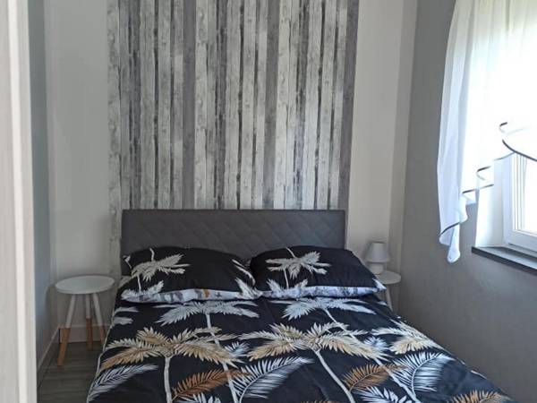 Domki pod katalpami Mikołajki