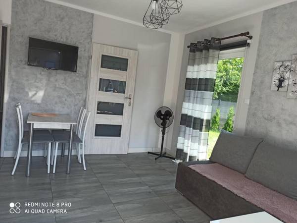 Domki pod katalpami Mikołajki