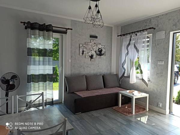 Domki pod katalpami Mikołajki