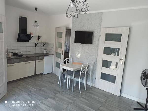 Domki pod katalpami Mikołajki