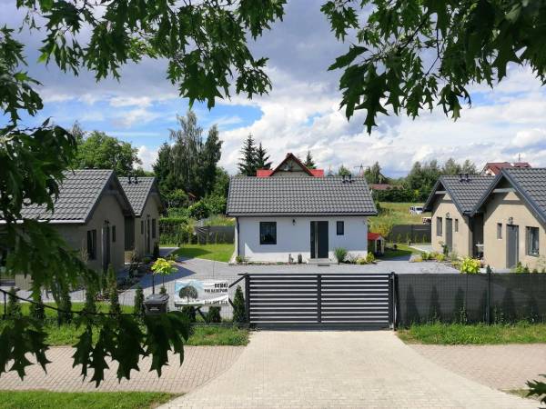 Domki pod katalpami Mikołajki