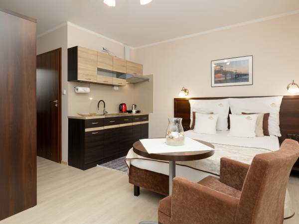 Pokój z aneksem kuchennym