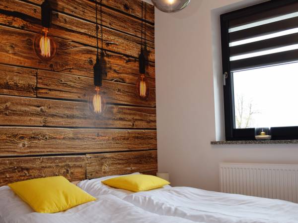 Sypialnia w apartamencie Słoneczne Wzgórze 