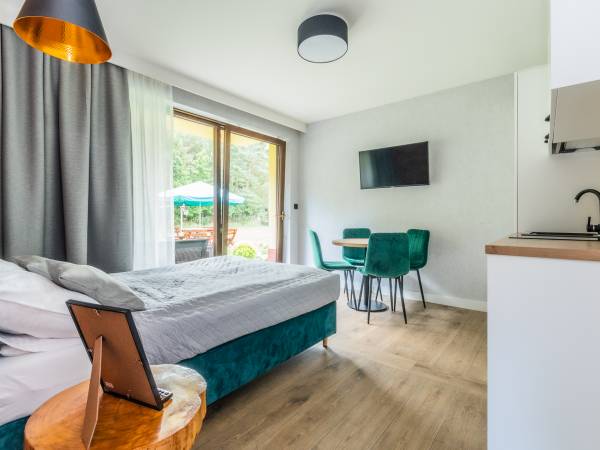 Gajówka - Całoroczne Pokoje i Apartamenty