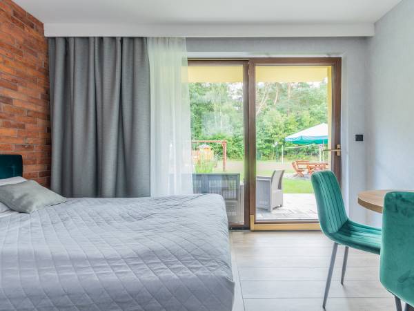Gajówka - Całoroczne Pokoje i Apartamenty