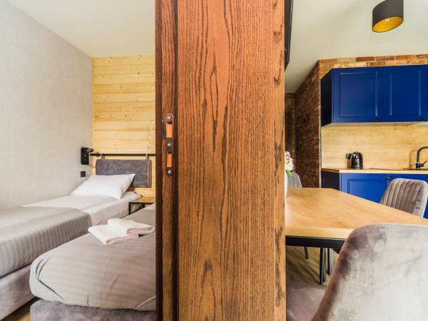 Gajówka - Całoroczne Pokoje i Apartamenty