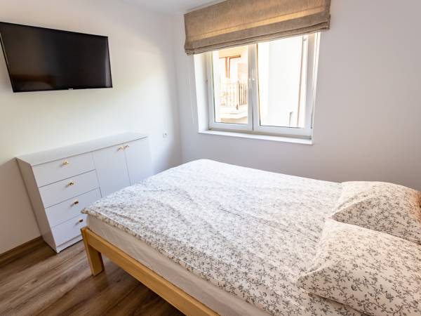 sypialnia w dwupokojowym studio