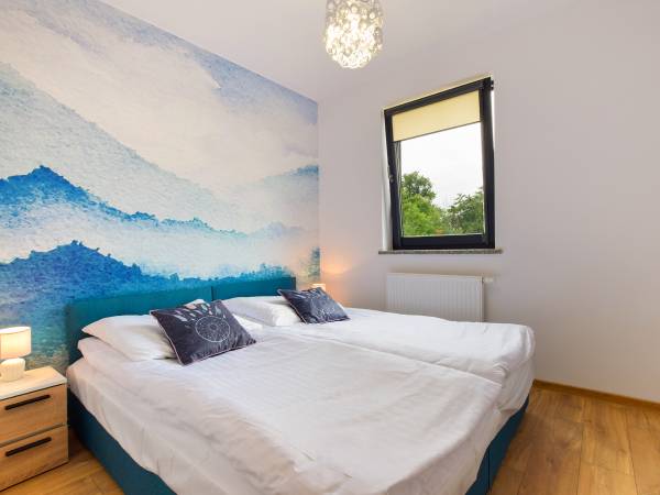 Sypialnia w apartamencie Górski Potok 