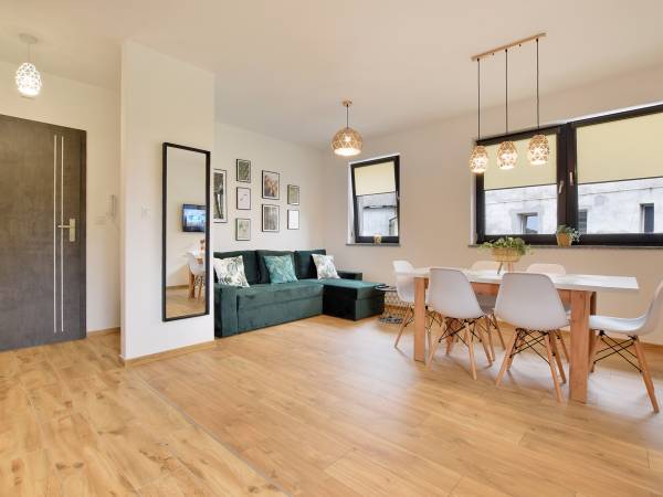 Salon w apartamencie Szum Lasu 