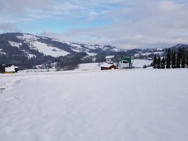 Dom z widokiem Szańce- Widok z działki na wyciąg orczykowy Szańce