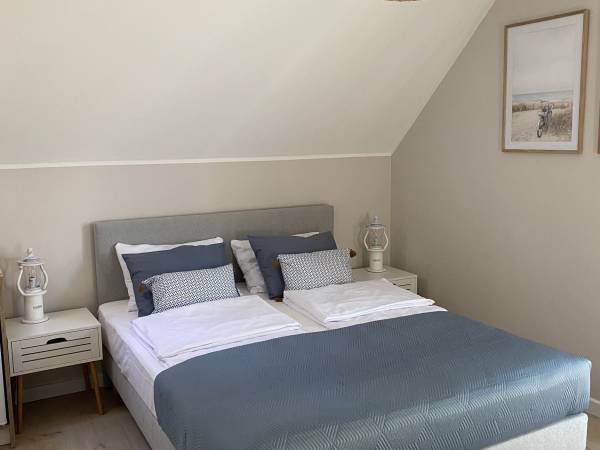 Sypialnia w apartamencie 6