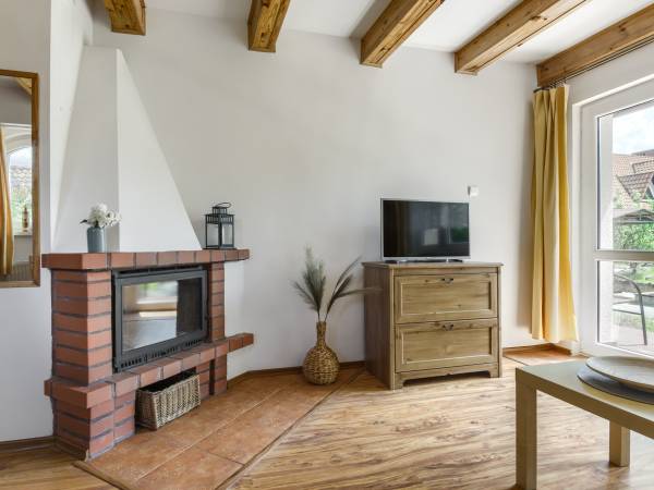 Apartament dwupoziomowy z kominkiem 