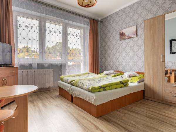 Pokoje z łazienkami Aura