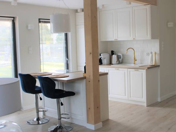 Domek Hampton nad jeziorem z jacuzzi całorocznym