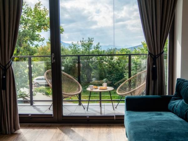 Apartament Kolorowe Poduszki