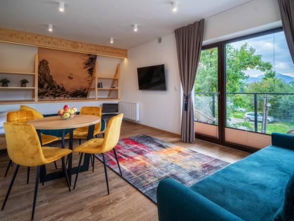 Apartament Kolorowe Poduszki