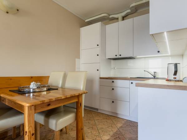 Apartamenty i Pokoje nad brzegiem jeziora Tałty