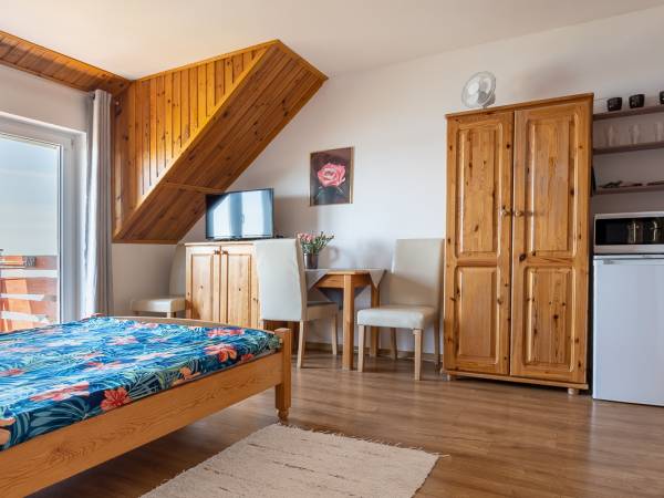 Apartamenty i Pokoje nad brzegiem jeziora Tałty