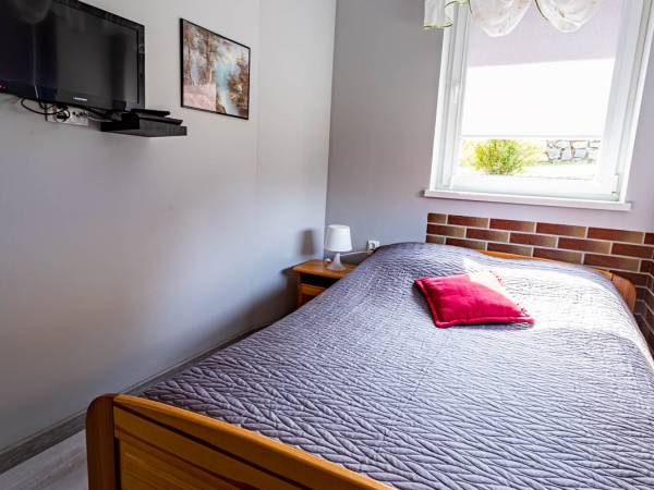 Studio z kominkiem - sypialnia