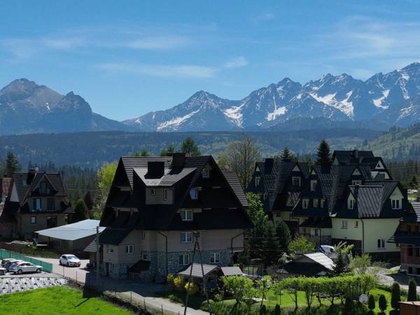 Ośrodek na tle gór