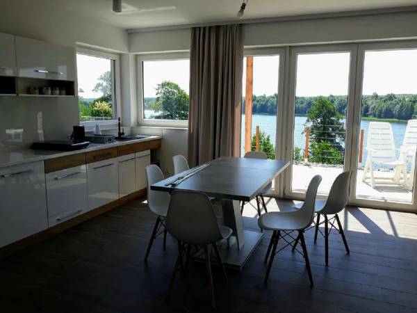 Domki nad Jeziorem BASEN SAUNA JACCUZI prywatny pomost