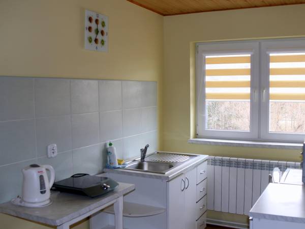 W pełni wyposażony aneks kuchenny dla pokoi: muzycznego, romantycznego i morskiego.