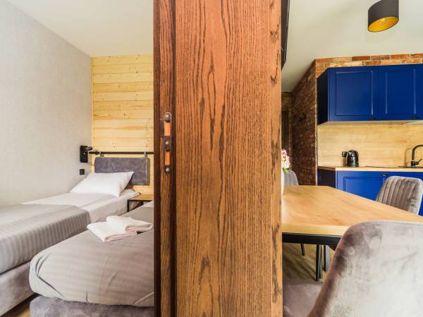 Gajówka - Całoroczne Pokoje i Apartamenty