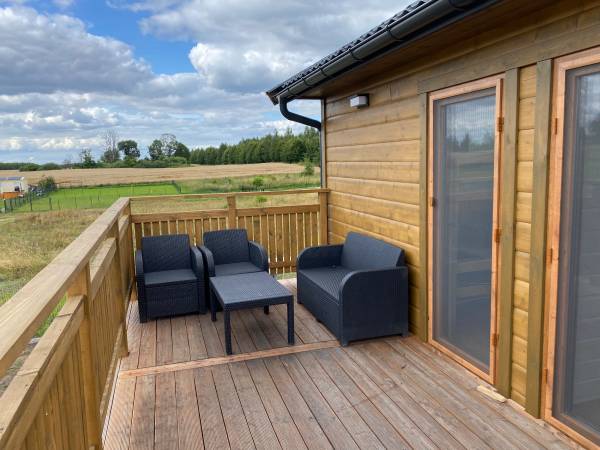 Domki WESTERN HOUSE Giżycko Fuleda Sauna Jacuzzi Kominek