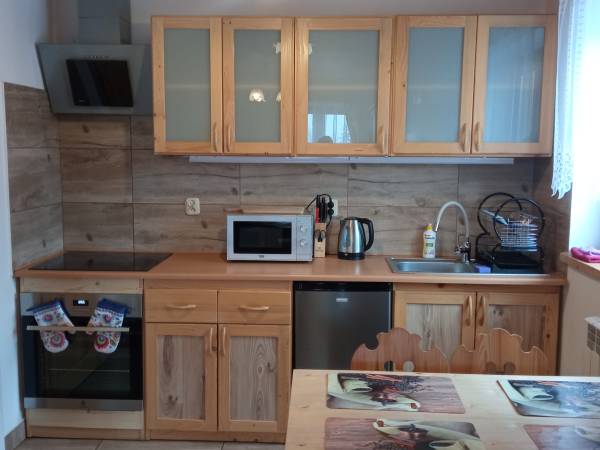 Domek z dwoma balkonami 