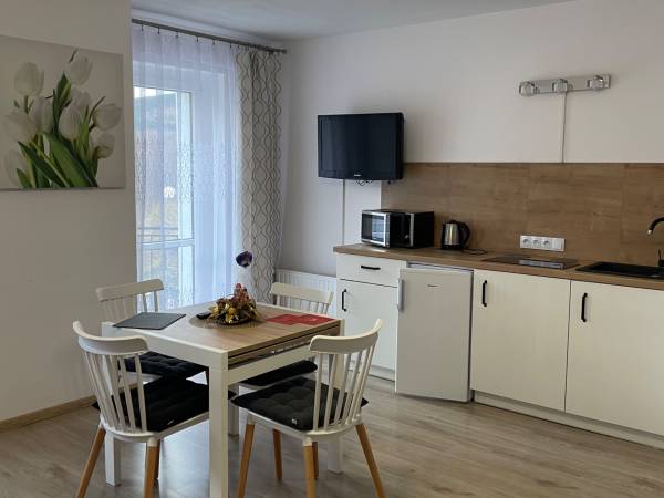 Pokój premium 3-4 os. z balkonem i anexem kuchennym