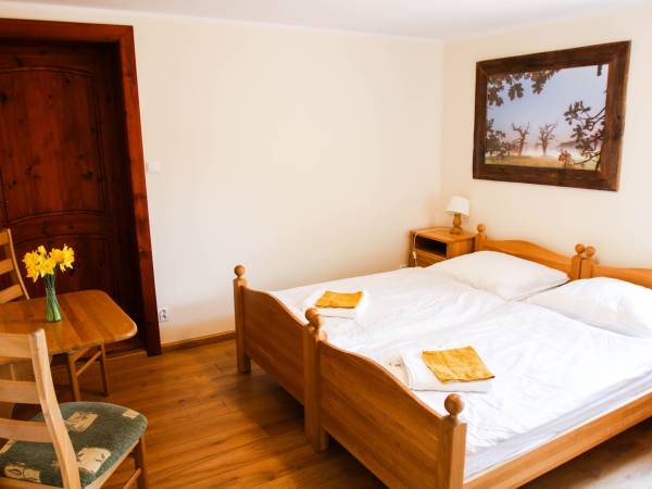 Sypialnia w apartamencie dębowym