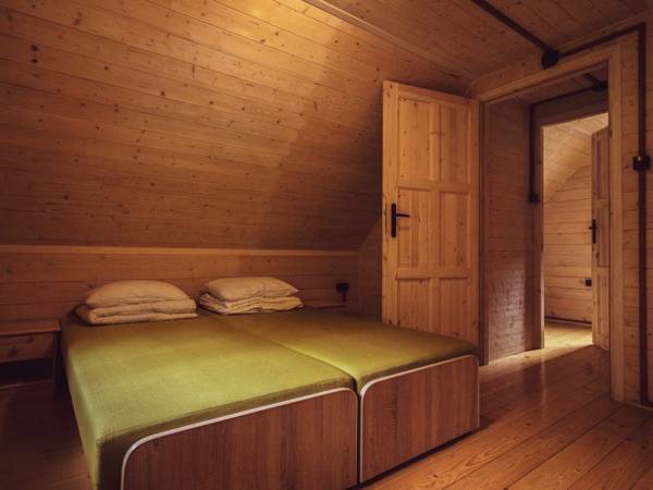 Wnętrze domków - sypialnia