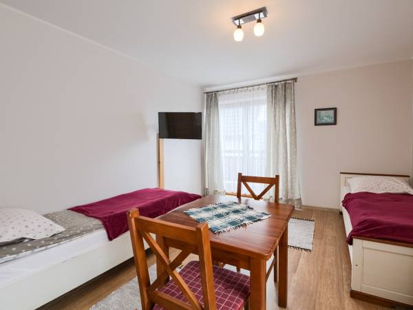 Pokój czteroosobowy w nowym domu