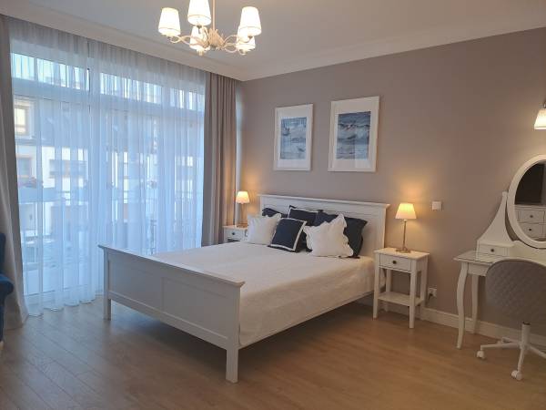 Apartament Leon sypialnia z balkonem