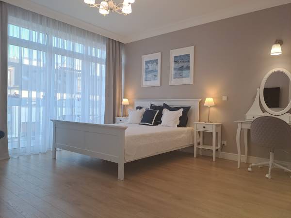 Apartament Leon sypialnia z balkonem