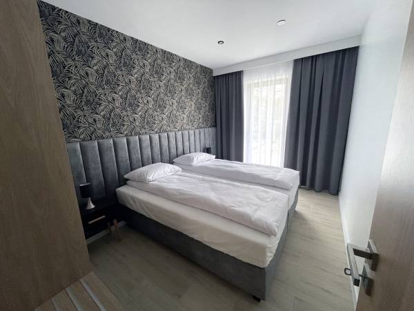 PATIO APARTAMENTY I DOMKI