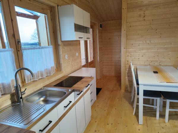 Kuchnia i wejście - Domek Drewniany