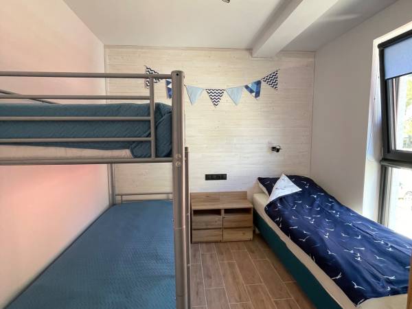 Sypialnia w apartamencie 5 osobowym 