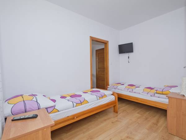 Pokój 4 -osobowy typu studio z aneksem kuchennym