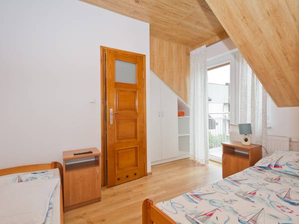 Pokój 4 -osobowy typu studio z aneksem kuchennym