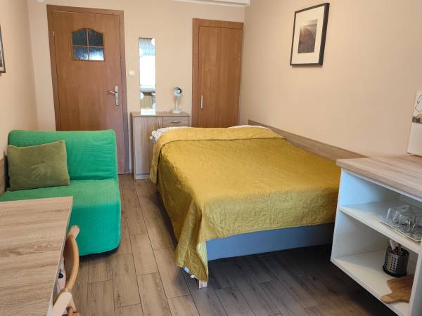 Pokoje i Apartamenty u Kryni