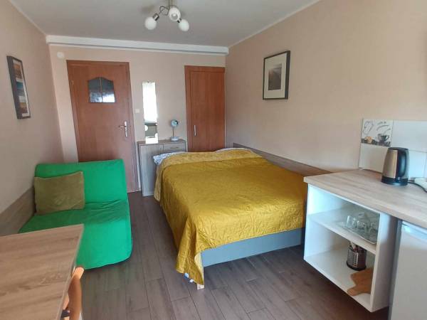 Pokoje i Apartamenty u Kryni